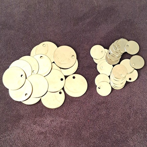 Silver tone round metal disc - round,